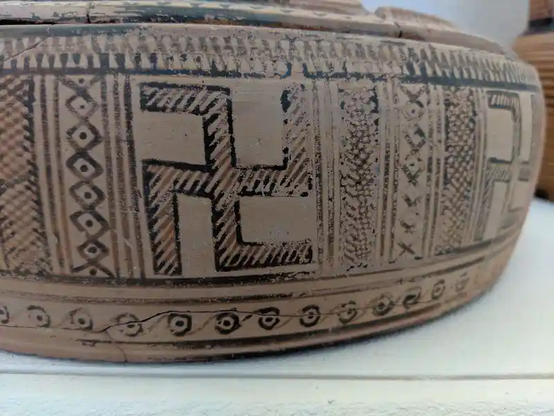 Close-up of swastika and meander motifs on a late geometric attic pyxis